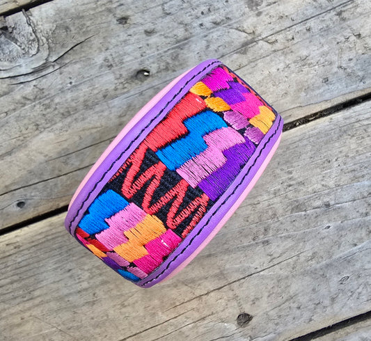 The Sofia (purple with pink padding) - scuffs from storage/discount