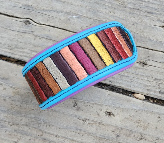 The Sofia (blue with purple padding)